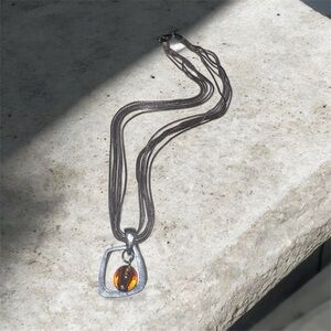 Elegant Silver Multi-Chain Necklace with Amber Glass Pendant